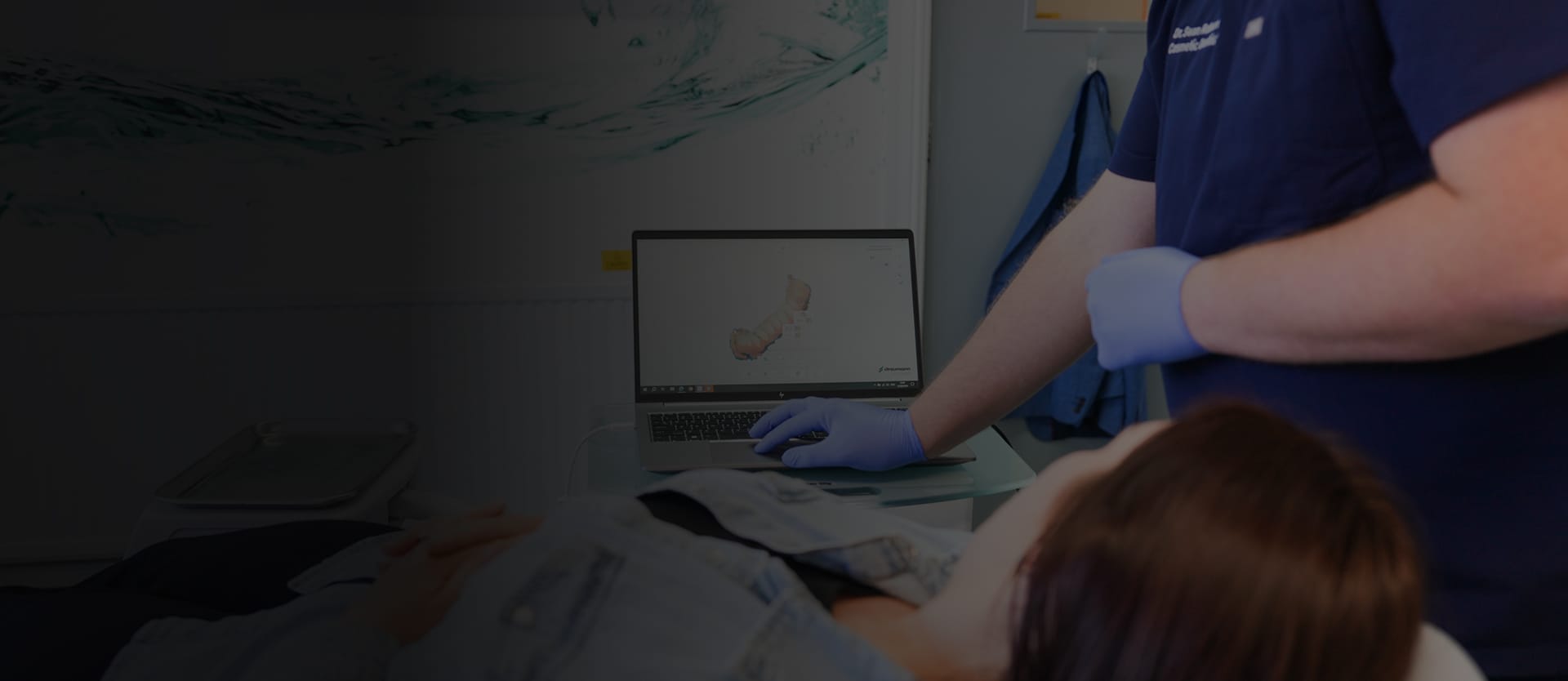 Dr Sean Roberts using digital dental scanning technology during treatment planning